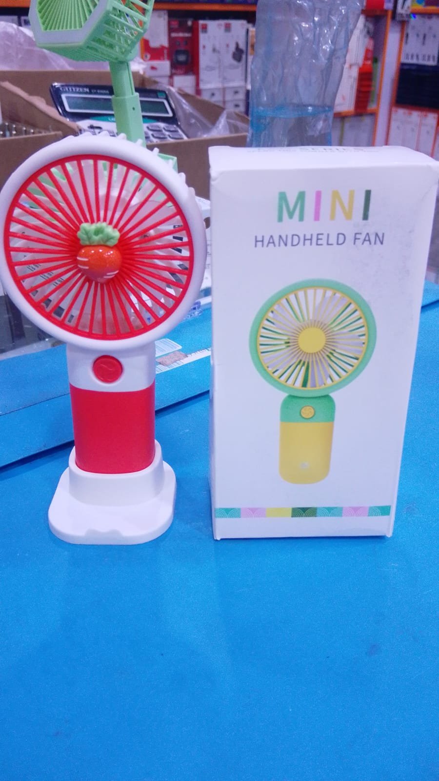 Mini Portable Handheld Fan with Desktop Base - Cute Carrot Design Rechargeable Personal Cooling Fan for Office, Students, and Travel - Image 3