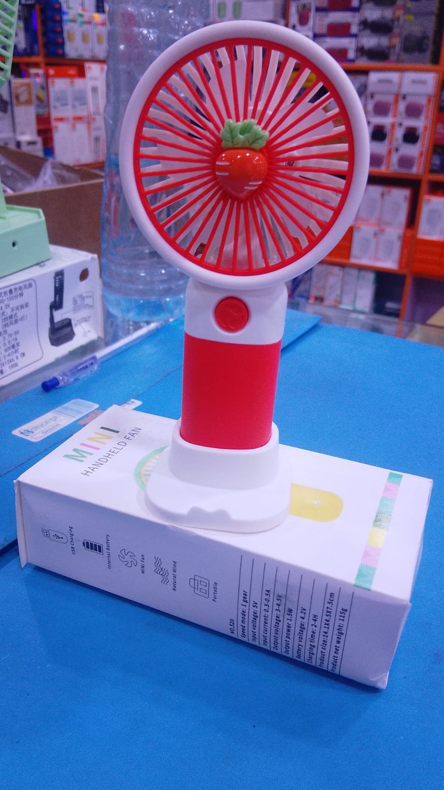 Mini Portable Handheld Fan with Desktop Base - Cute Carrot Design Rechargeable Personal Cooling Fan for Office, Students, and Travel - Image 4