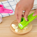Garlic Press Grater Slicer Plastic Grinding Tool Kitchen Accessories(random color ) thumbnail 2